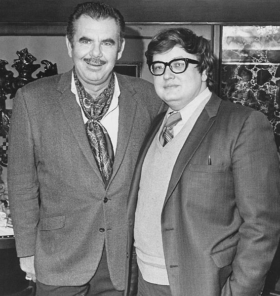 A young Roger Ebert with Russ Meyer.  This serves as an example of why I also avoid sweater vests.  On a personal note, I was always more of a Siskel man myself.  (Image from wikimedia commons)