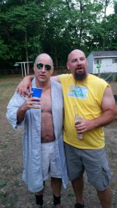 At first glance, this vignette appeared to have some promise, but it turned out to be from a "Trailer Park Boys" themed party.  If you look closely, you'll see that the big lunk on the right is actually holding two beers - what a brute!